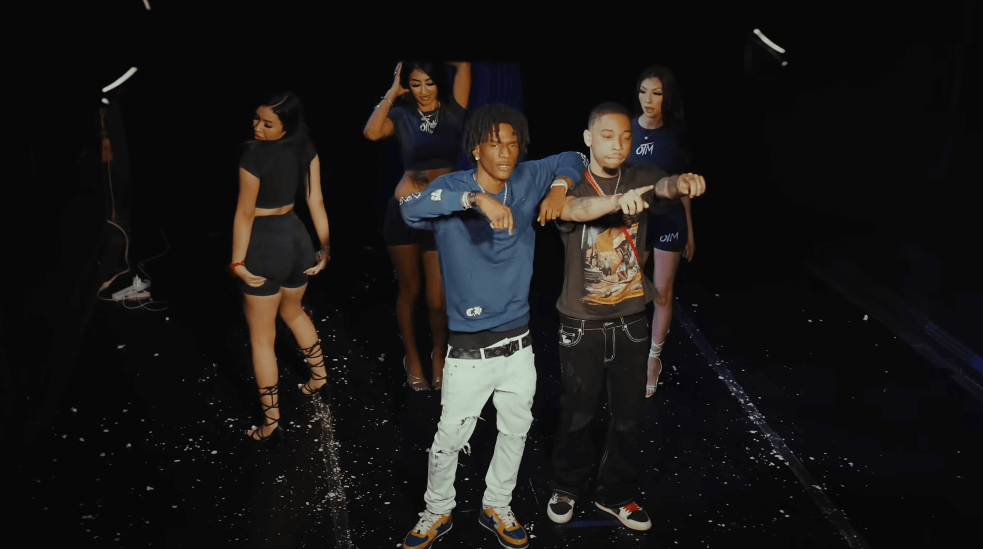 Load video: Blue Pesos wearing our Distressed jeans in OTM&#39;s - Double Date music video